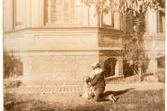 Flavel child playing with his dog.