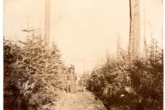 Flavel Family member walking with her dog.